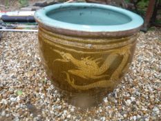 A Hong Kong sourced garden urn with incised dragon decoration