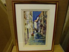 ROBERTO LUIGI VALENTE "Venetian backwater with figures on a bridge", oil on paper, signed lower