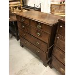 A 19th Century oak chest, the top with moulded edge over two short and three long graduated