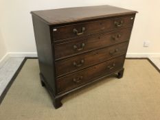 A late George III mahogany chest, the top with applied moulded edge over four long graduated drawers