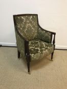 A circa 1900 mahogany framed and upholstered salon chair, the arms on baluster turned supports,