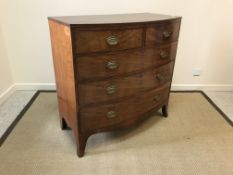 A 19th Century mahogany bow fronted chest, the plain top with rosewood and satinwood strung edging