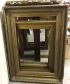 Three 19th Century gesso and gilt frames, the largest approx 107 cm x 157 cmCondition ReportInternal