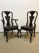 A set of six early 20th Century mahogany framed dining chairs in the George I taste, the carved
