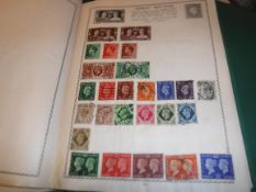 A box containing a collection of various mounted and unmounted British and World stamps in various