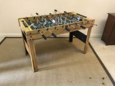 A BCE Table Sports table football game on pine effect base, 122 cm wide x 61 cm deep x 77.5 cm high