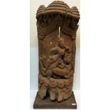 A Thai carved teak figure group as "Figure with dragon", 45 cm wide x 103 cm high