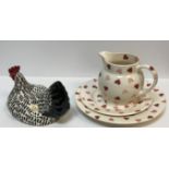 An Emma Bridgwater "Pink Hearts" pattern jug, plate and smaller plate, together with a "Black and