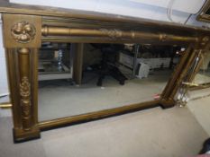 A 19th Century giltwood and gesso framed column decorated overmantel mirror, approx 159 cm long x 86