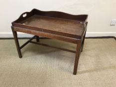 Two mahogany butler's trays on fixed stands in the Georgian manner, 76 cm x 47 cm x 54.5 cm high and