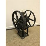 A Victorian cast iron and brass double fly wheel coffee grinder, 70 cm high