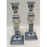 A pair of Royal Copenhagen Musselmalet blue and white and relief decorated candlesticks, No'd. 1/