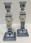 A pair of Royal Copenhagen Musselmalet blue and white and relief decorated candlesticks, No'd. 1/