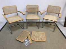 A set of three Cesca armchairs with caned back and seat on a chrome frame, originally designed by