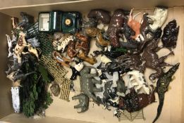 A collection of Brtiain's and other painted lead zoo and farm animals, together with a Britain's SWB