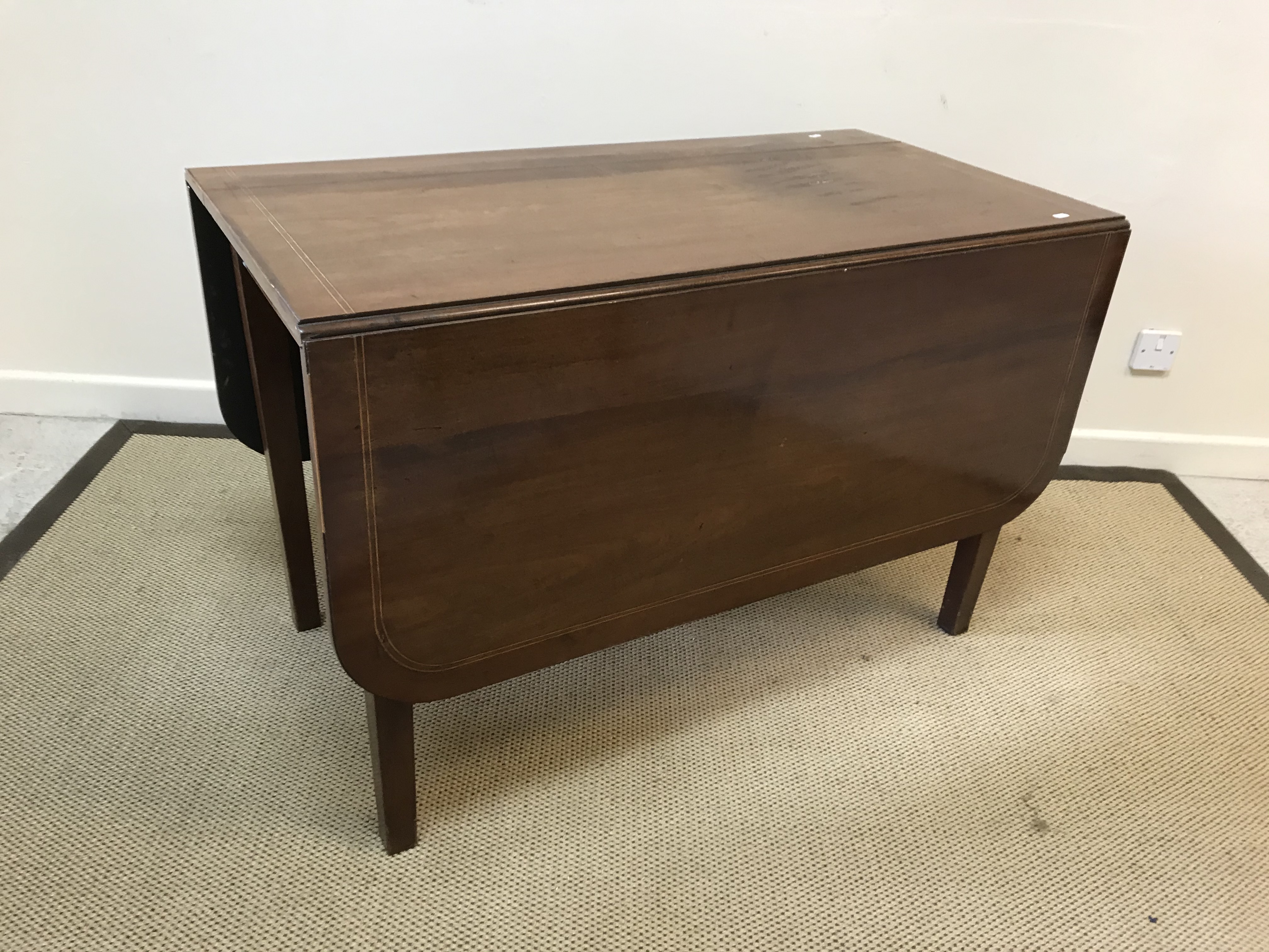 An early 19th Century mahogany rectangular drop-leaf dining table, the plain top raised on square - Image 2 of 4