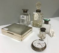 A collection of Victorian and later silver mounted cut glass scent bottles, together with a mid 20th