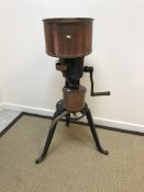 A Melott Separator Sale Co. of Bristol, size C, No. 39727 milk separator with copper bowls on a cast