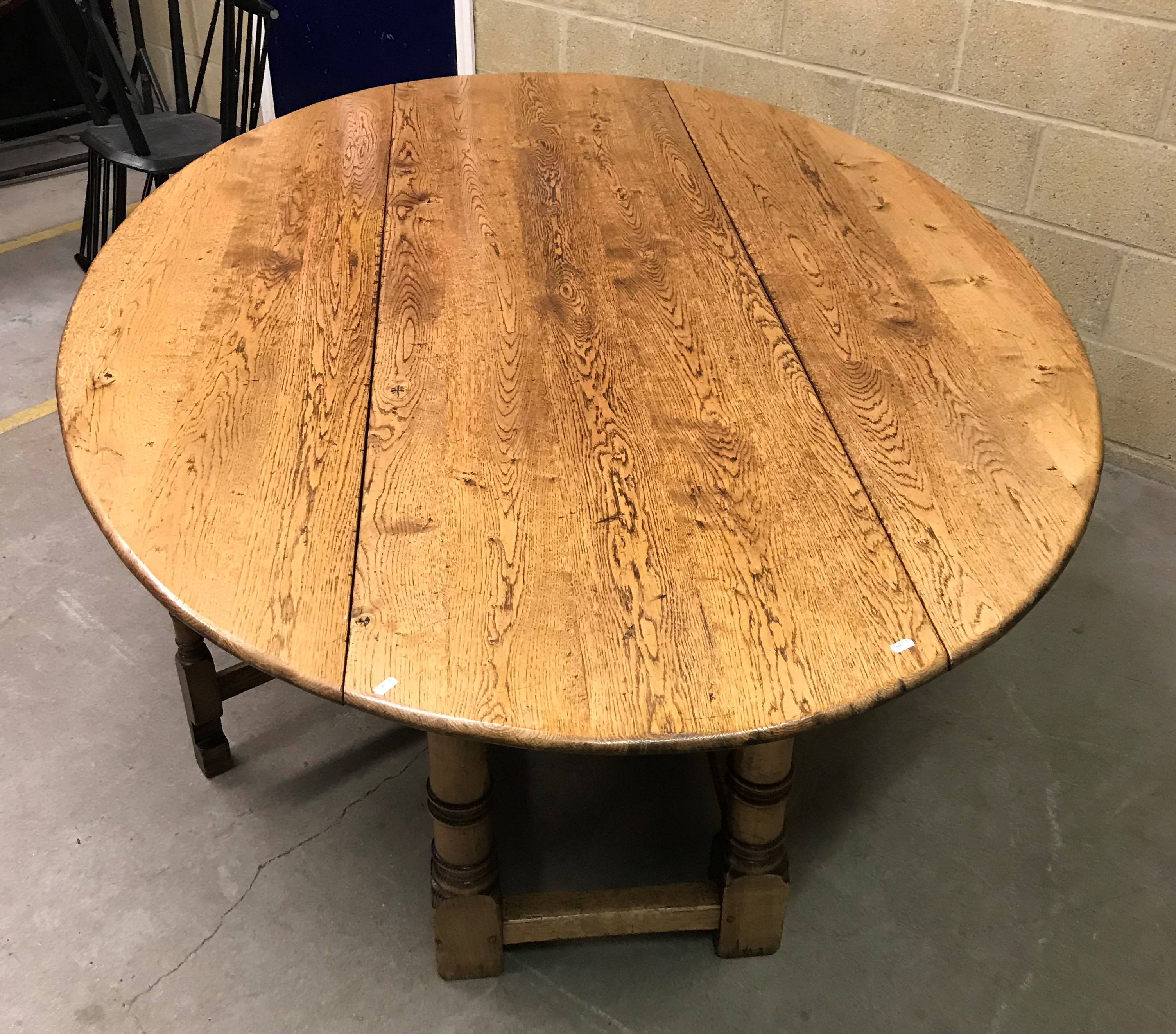 A modern oak wake table in the 18th Century manner, the plain top with two drop leaves on a double - Image 2 of 2
