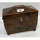An early 19th Century burr yew veneered and box wood strung two section tea caddy of sarcophagus