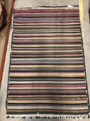 A multicoloured striped Kelim rug, approx 186 cm x 123 cm, together with a modern IKEA blue, cream