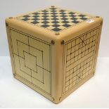 An Alison Henry game cube including Noughts and Crosses, Backgammon, Go, Chess / Draughts, Nine