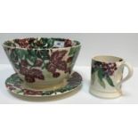 A collection of Emma Bridgwater pottery wares to include "Hawthorn Berry" pattern oval platter,