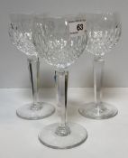 A collection of Waterford cut glass drinking glasses including six hobnail cut hocks, eight