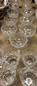 Eleven facet cut grape and vine etched saucers, six Royal Doulton pineapple cut wines, four