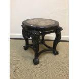 A Chinese rosewood urn stand, the Rosso marble flower head shaped top within a moulded edge,