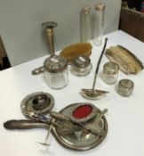 A collection of silver wares to include a collection of various cut glass silver topped dressing