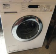 A Miele Honeycomb Care W5740 water control system washing machine