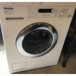 A Miele Honeycomb Care W5740 water control system washing machine