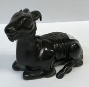 A Chinese bronzed lead figure of a "Recumbent Goat", 18 cm long x 13.2 cm highCondition ReportHas