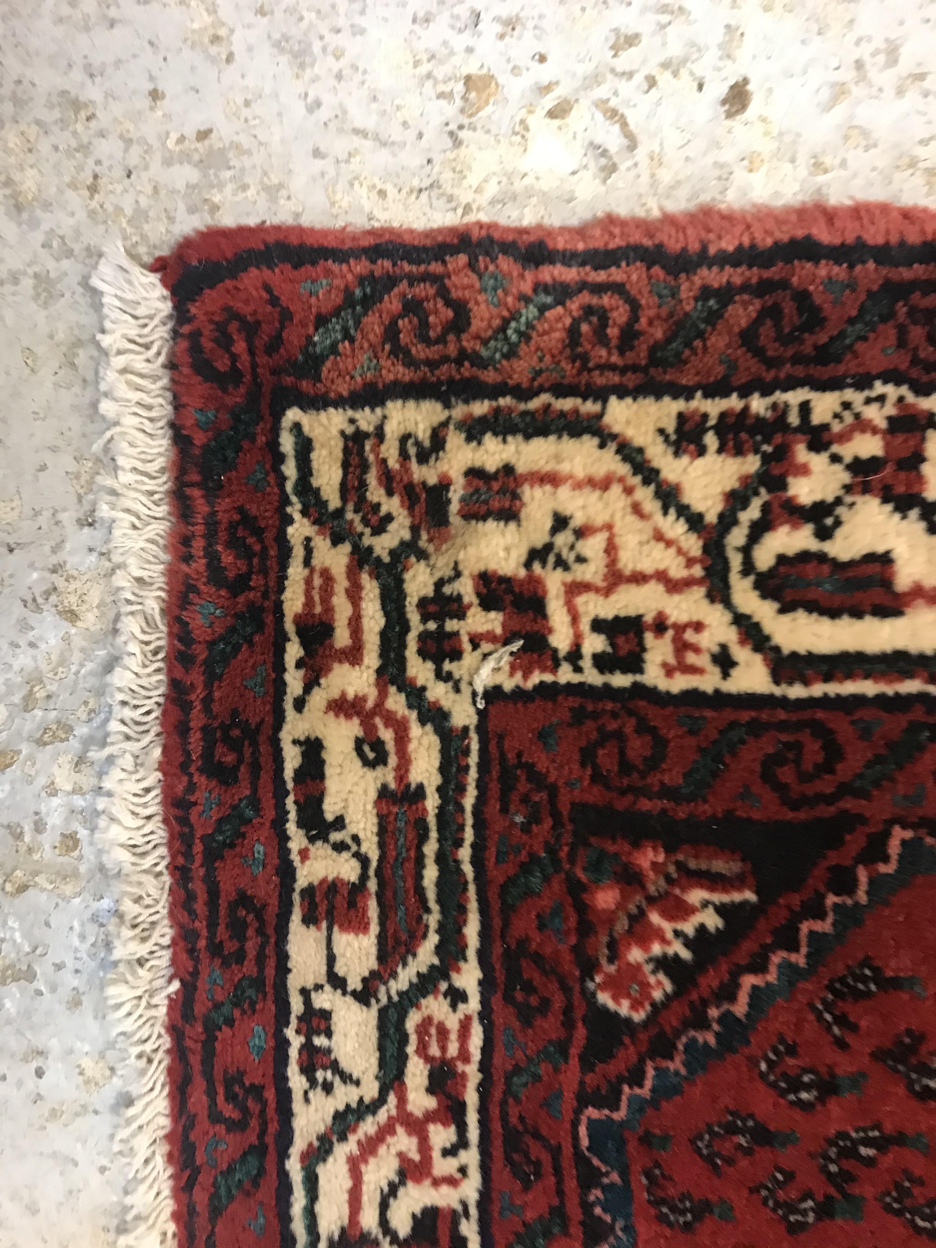 A modern Persian (Iran) runner, the red ground with repeating lozenge medallion with hook style - Image 15 of 23