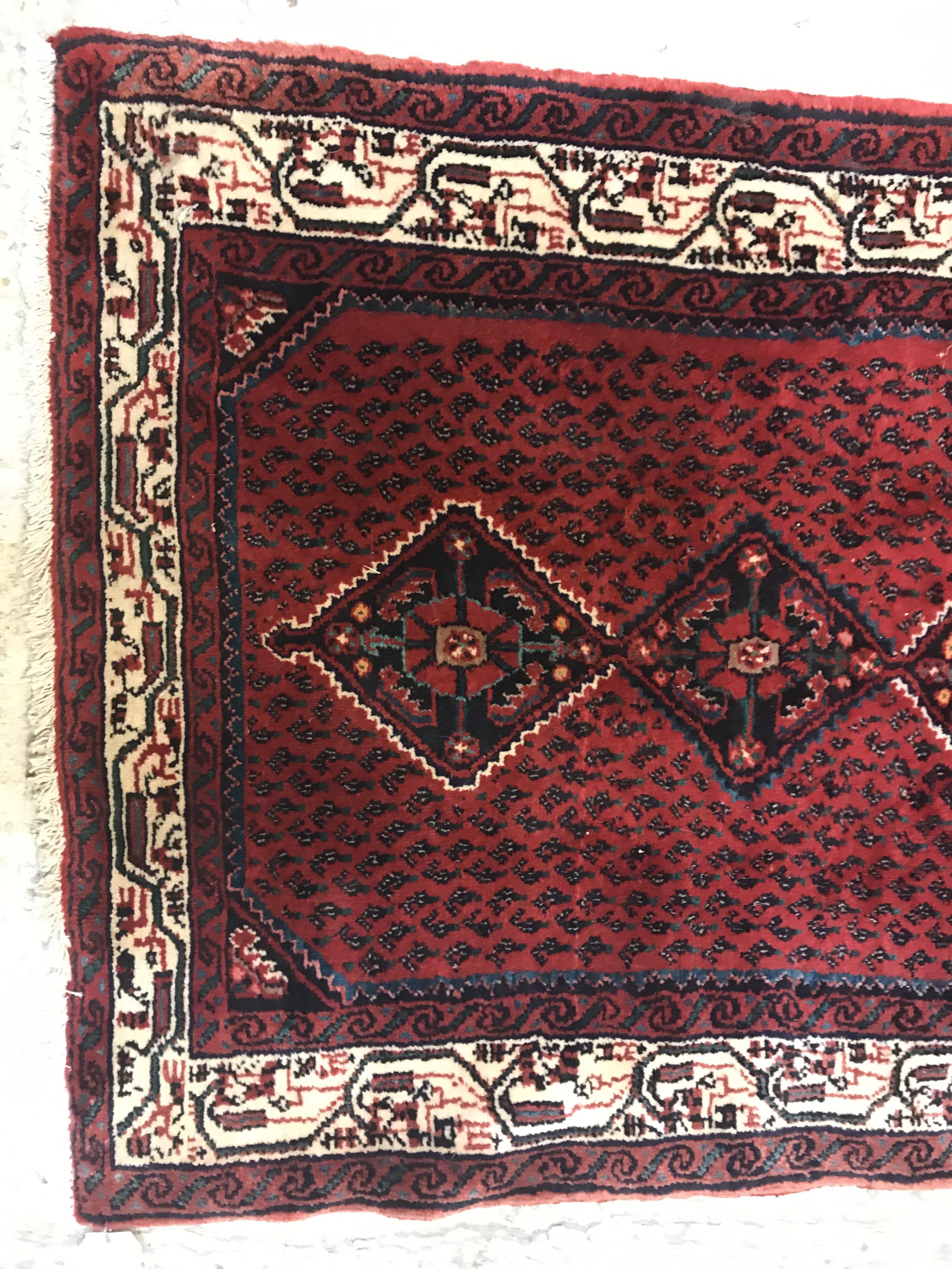 A modern Persian (Iran) runner, the red ground with repeating lozenge medallion with hook style - Image 4 of 23