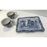 A box containing a collection of blue and white "Willow" pattern china, a modern decorative fire