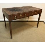 A circa 1800 Italian walnut and inlaid writing table, the top with parquetry banded decoration