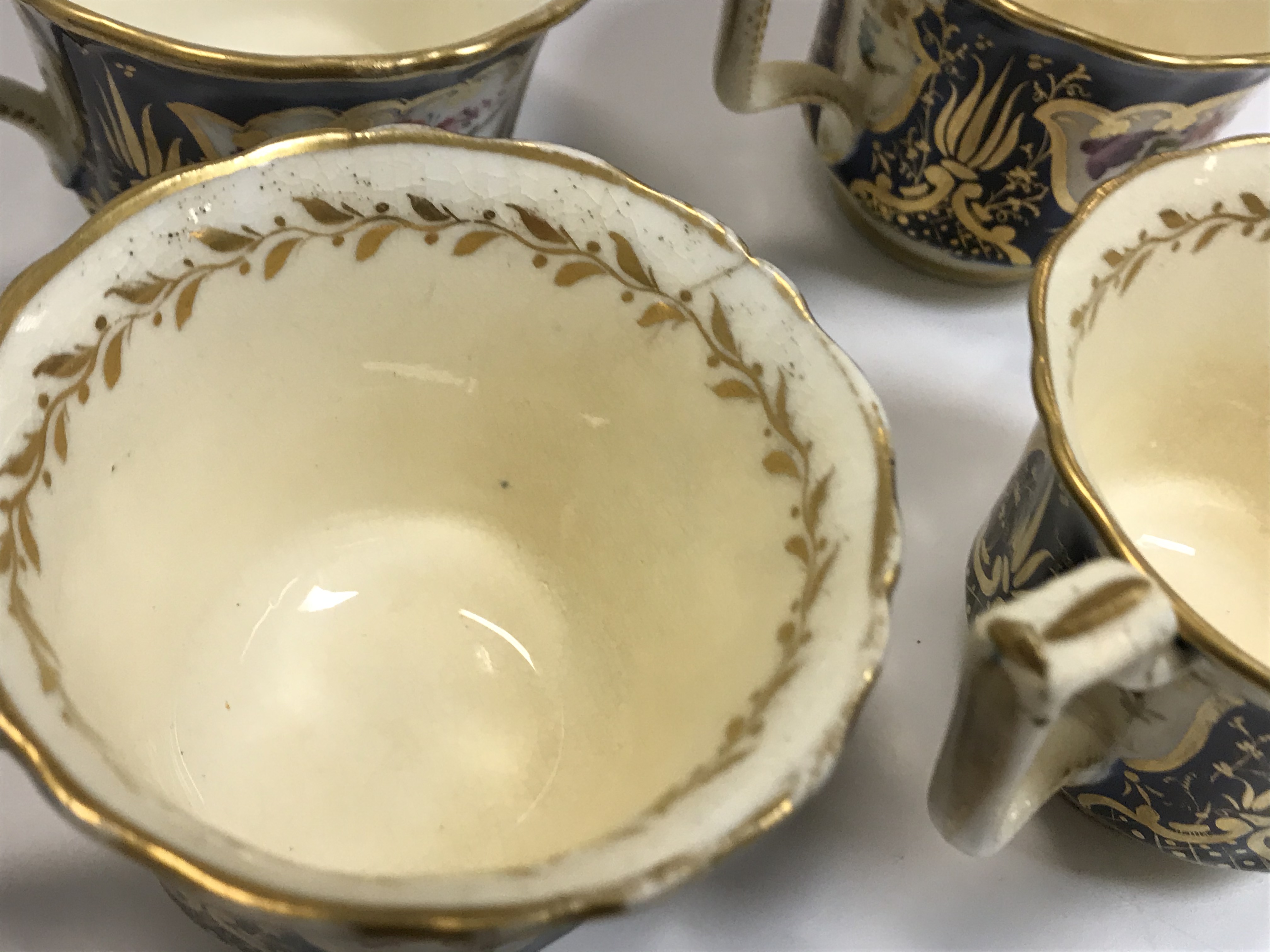 A 19th Century Staffordshire pottery part tea set, royal blue banded and gilt lined with panels of - Image 27 of 45