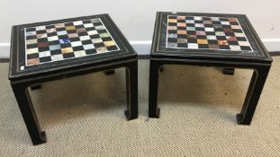 A pair of black lacquered and gilt decorated Chinese style occasional tables, the square tops set