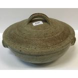 A collection of various studio pottery including a John Vasey (St. Agnes) vase of oval form, 21 cm