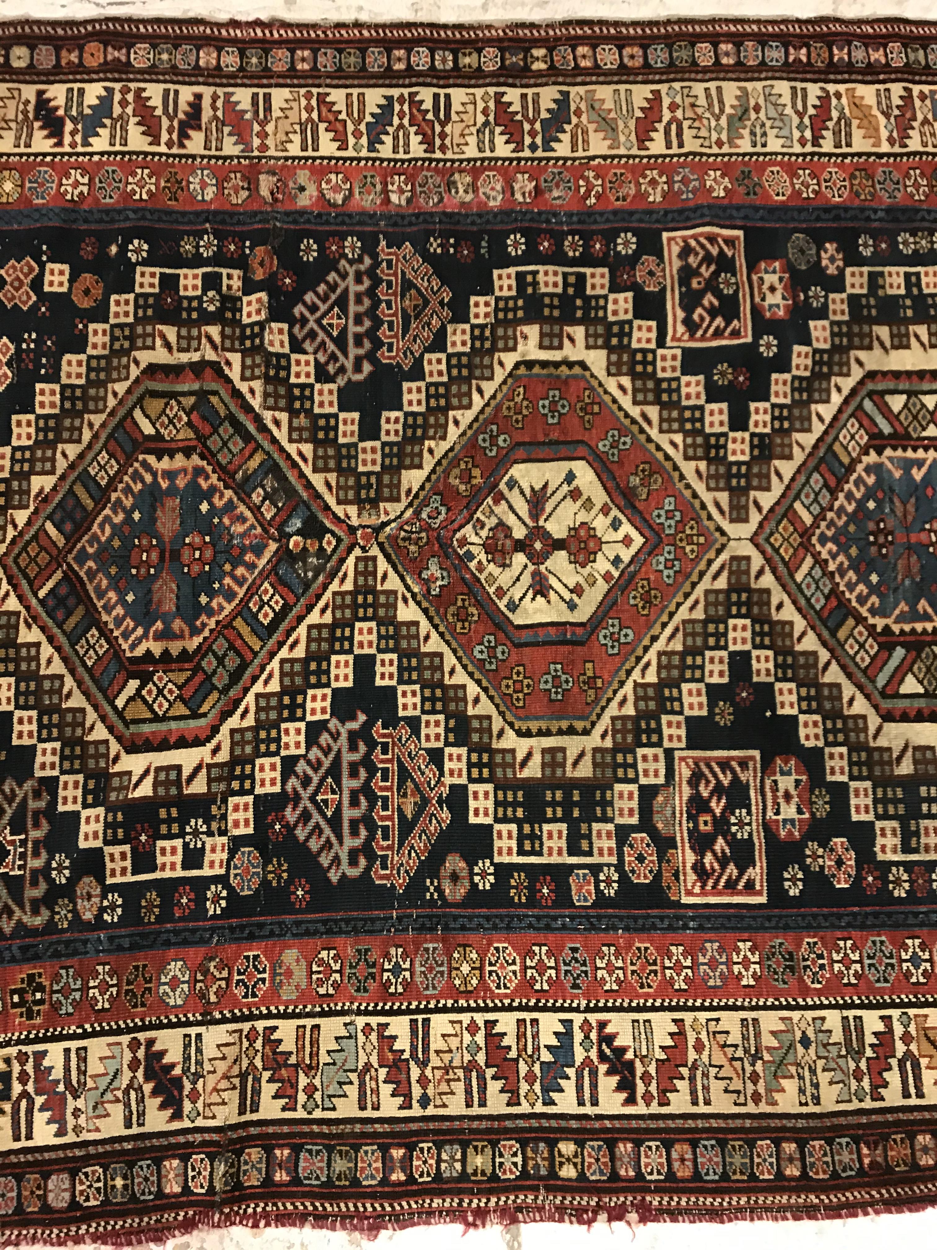 A fine Shirvan runner, the central panel set with repeating medallions on a dark blue stylised - Image 3 of 8