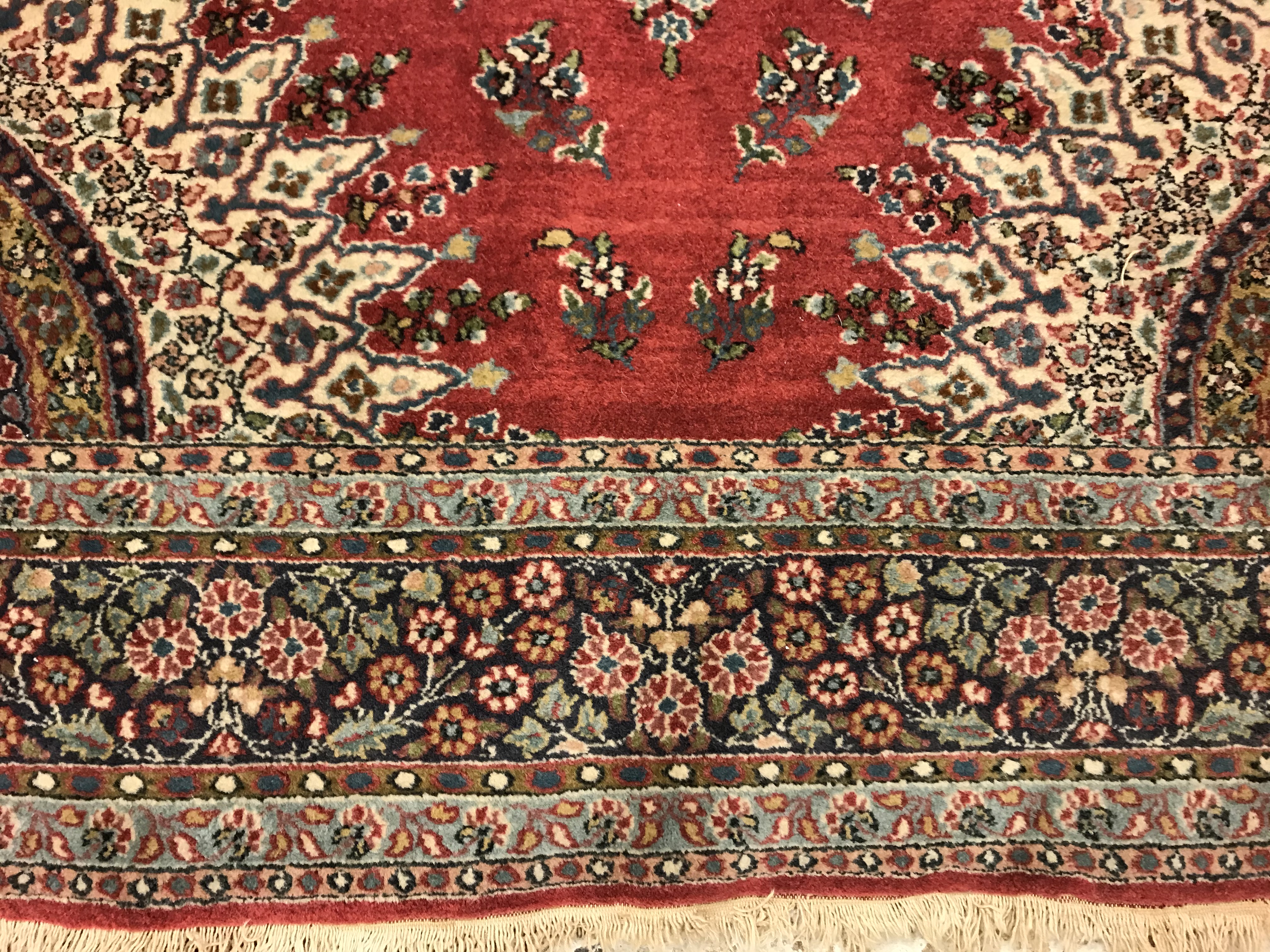A pair of fine Oriental rugs, the central panel set with floral decorated circular medallion on a - Image 34 of 48