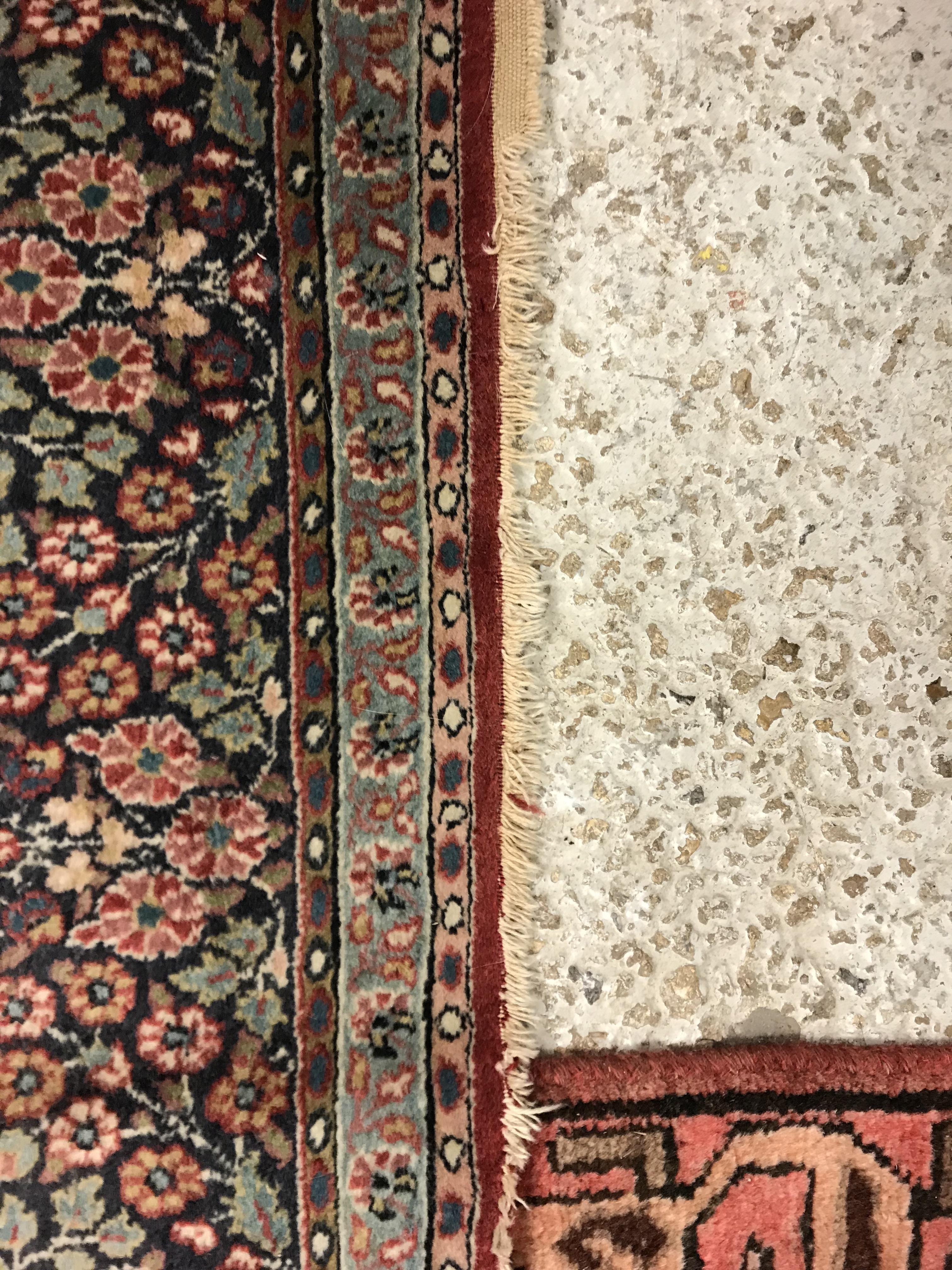 A pair of fine Oriental rugs, the central panel set with floral decorated circular medallion on a - Image 12 of 48