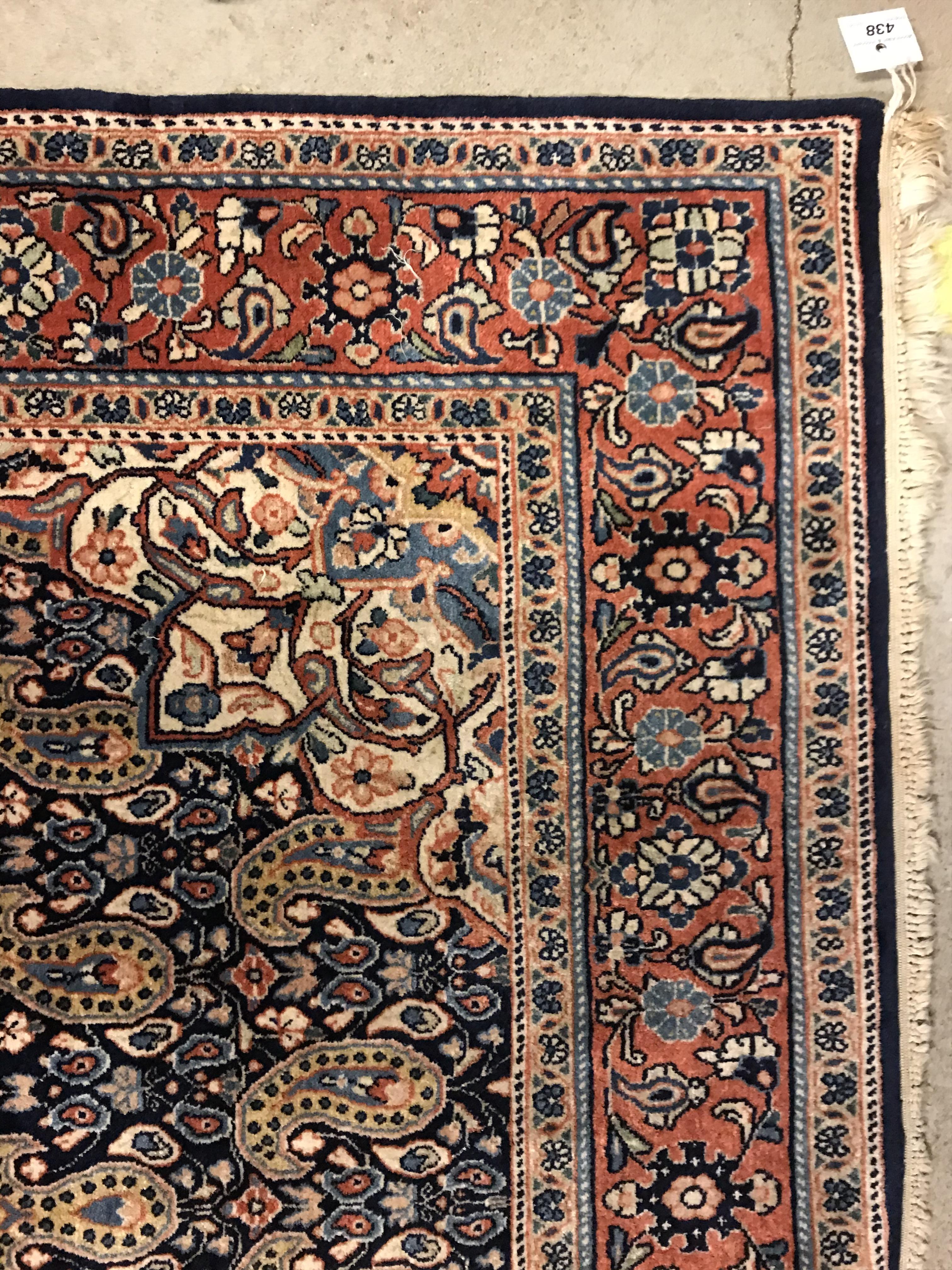 A Kashan carpet, the central panel set with floral decorated medallion on a dark blue hook decorated - Image 11 of 14