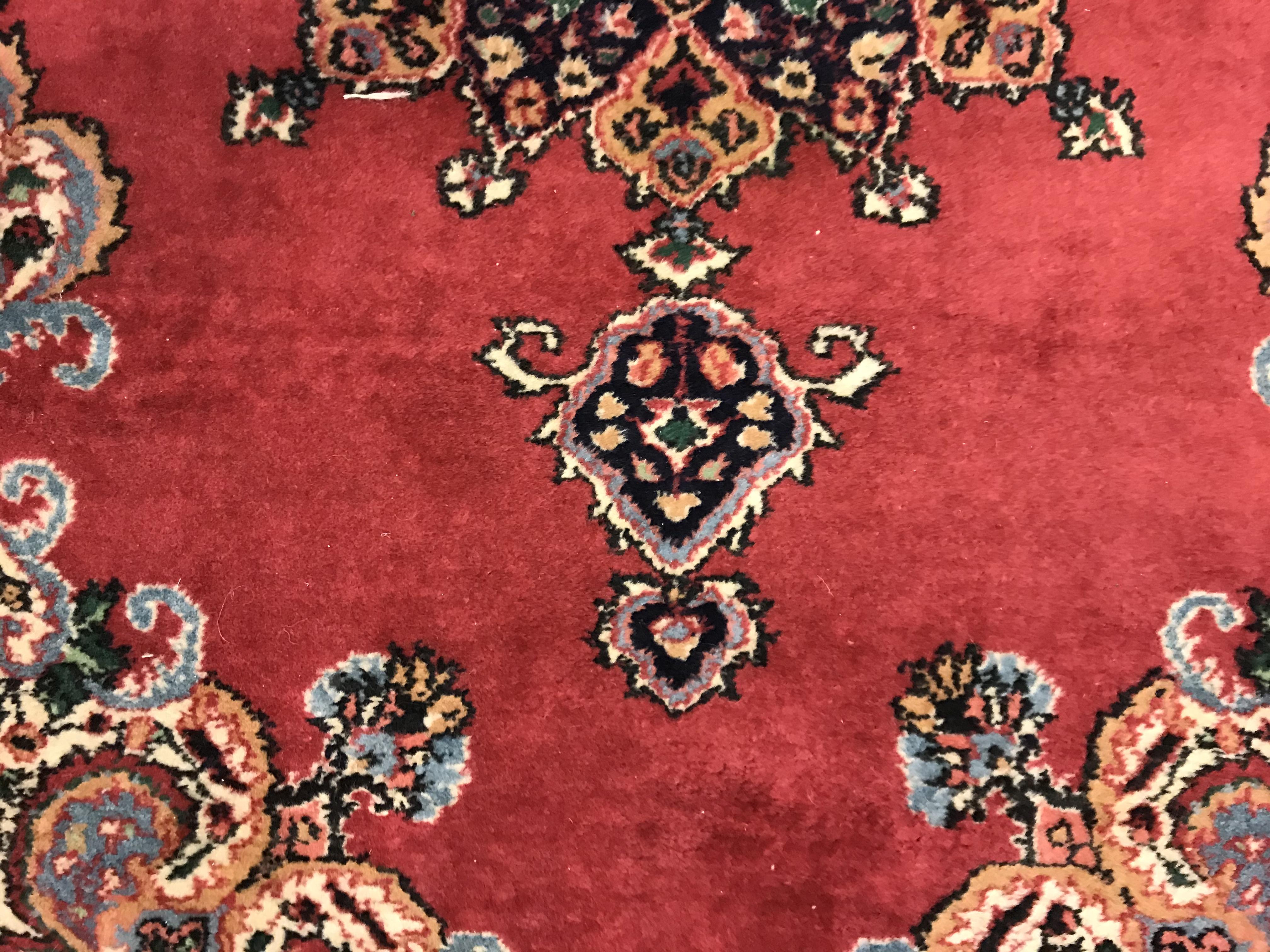 A pair of fine Oriental rugs, the central panels set with floral decorated circular medallion on a - Image 16 of 41