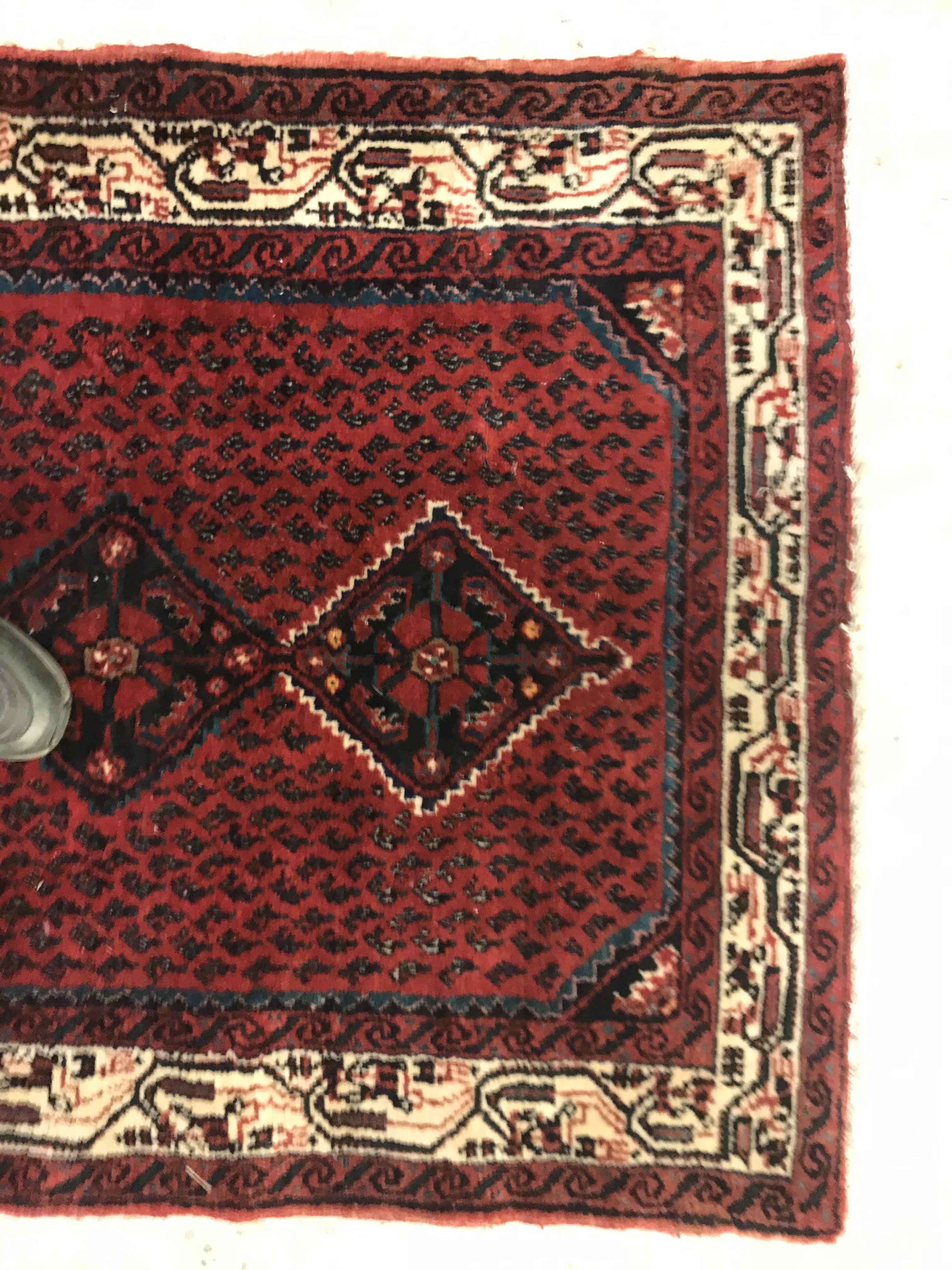 A modern Persian (Iran) runner, the red ground with repeating lozenge medallion with hook style - Image 14 of 23