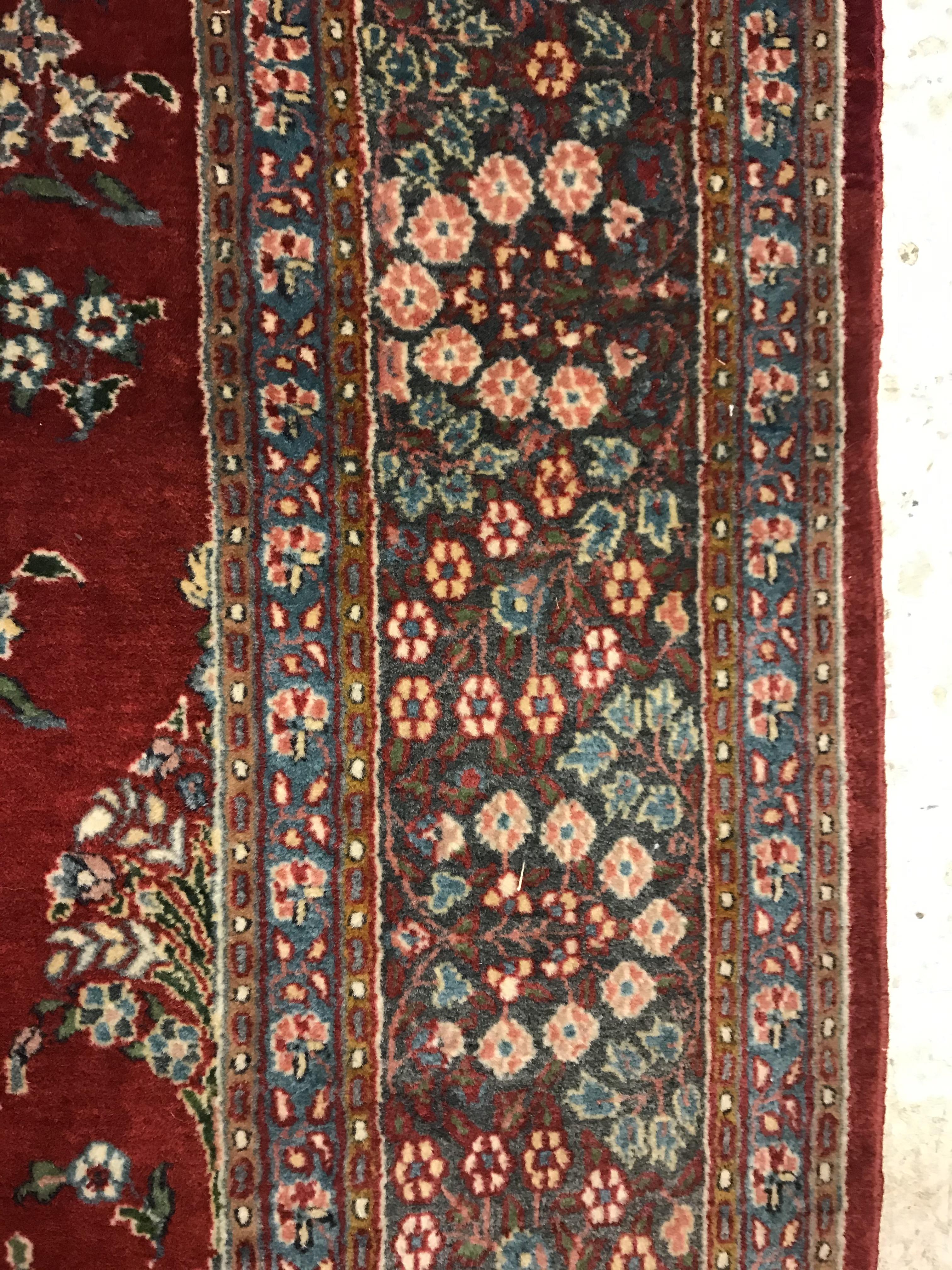 A pair of fine Oriental rugs, the central panels each set with floral decorated circular medallion - Image 41 of 41