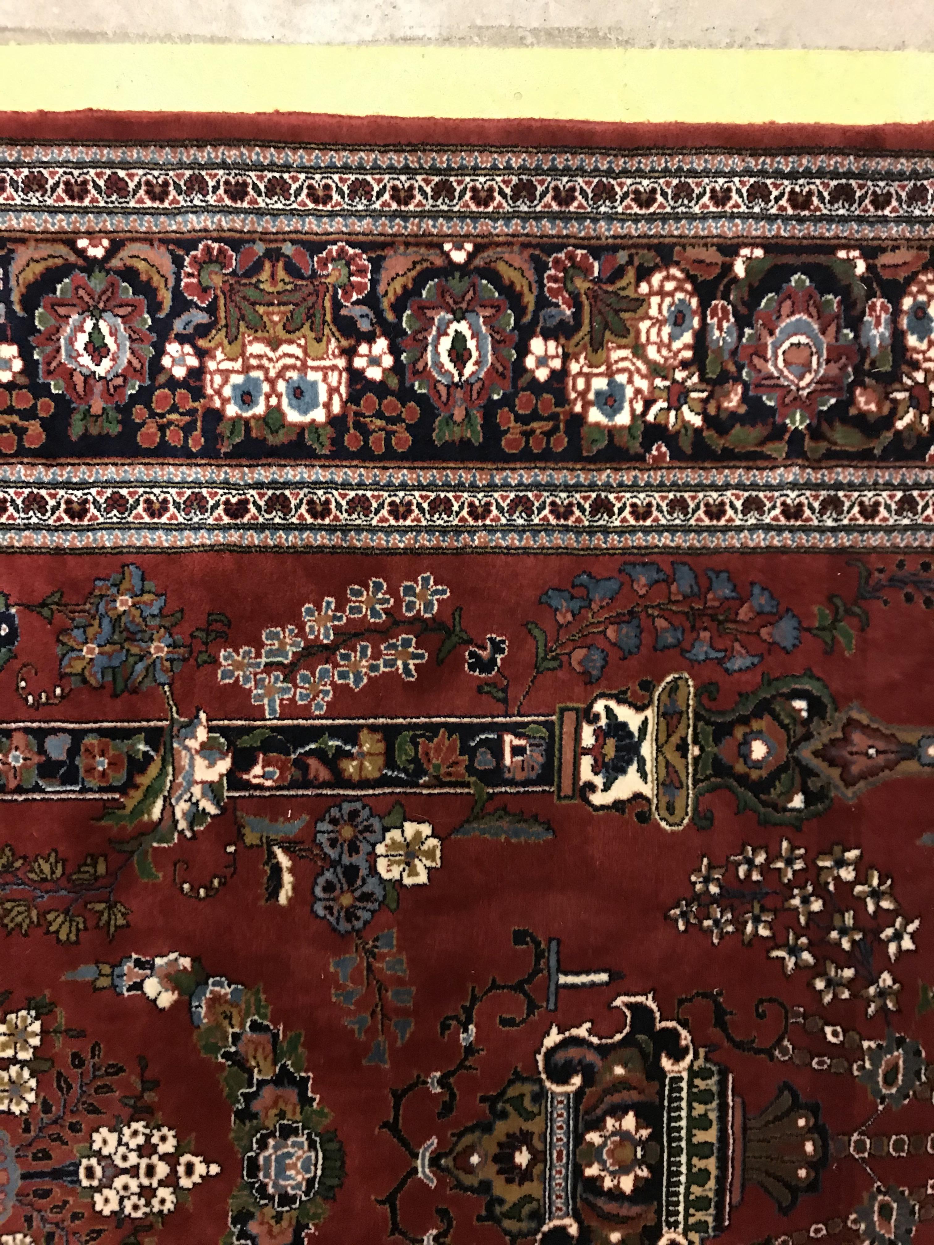 A Kashan prayer rug, the central panel set with Mirhab design with vase of flowers to base, on a red - Image 6 of 13