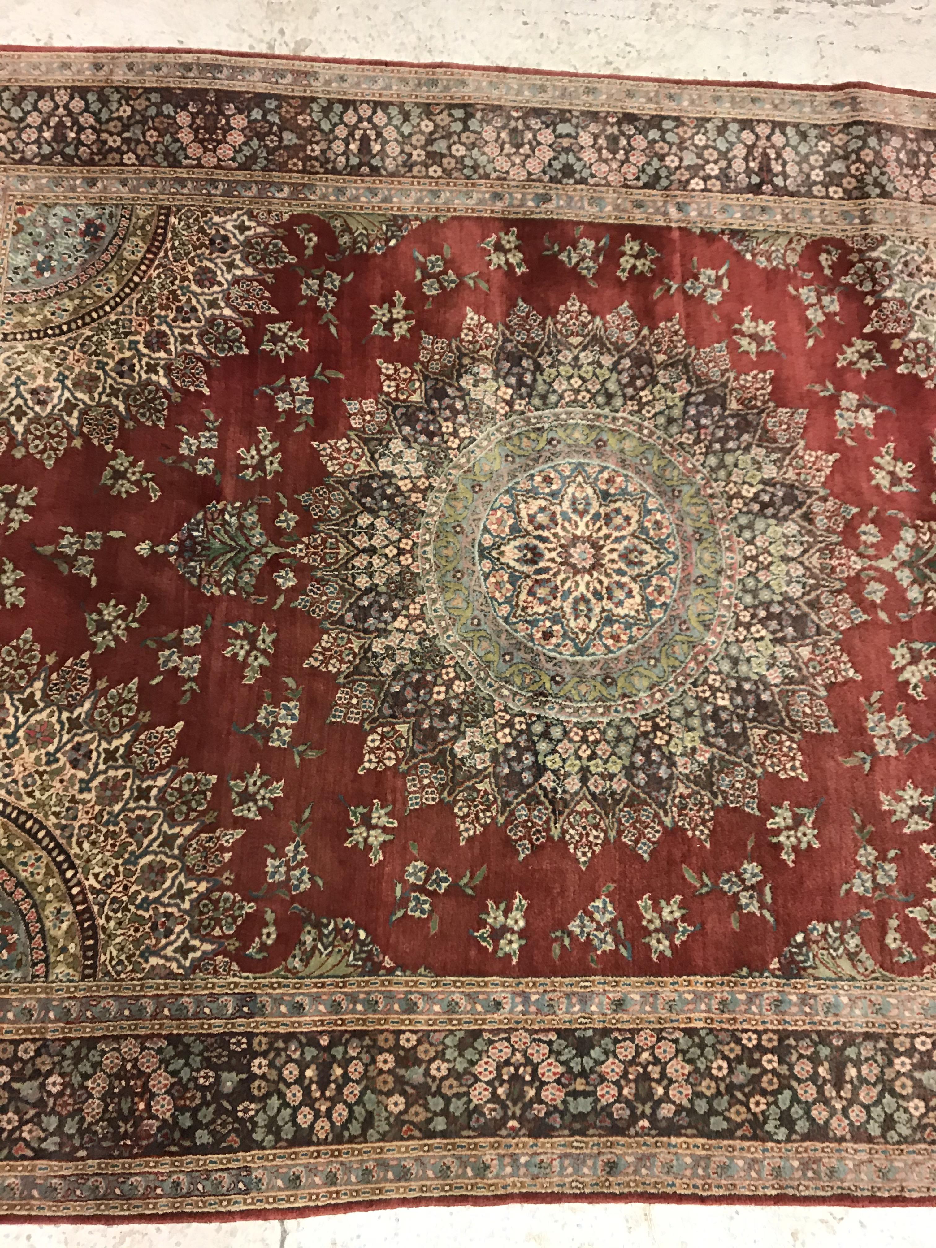 A pair of fine Oriental rugs, the central panels each set with floral decorated circular medallion - Image 3 of 41